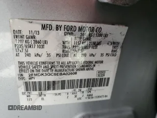 2014 Ford Edge SE z VIN 2FMDK3GC6EBA02608, wystawiony jako Copart lot #61300425 z przebiegiem 139 764 mil mil oraz Szkoda całkowita • Salvage title. Historia ofert i sprzedaży dostępna na DreamBid. Obrazek 13.