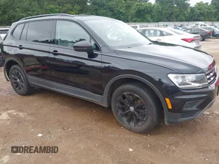 2020 Volkswagen Tiguan S with VIN 3VV1B7AX7LM102966, listed as a IAAI auction lot 42365428 with 94,921 mi miles and . Bid and sale history available at DreamBid. Image 1.