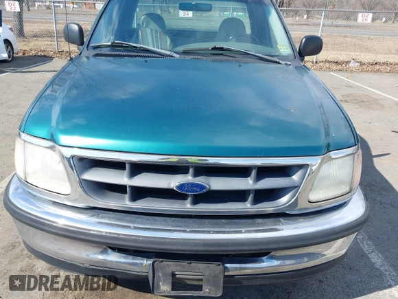 1998 Ford F-150 with VIN 1FTZF1723WNC12776, listed as a IAAI auction lot 41599872 with 125,007 mi miles and . Bid and sale history available at DreamBid. Image 12.
