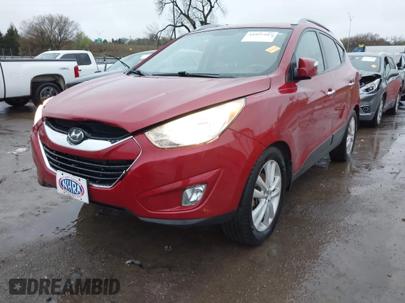 2013 Hyundai Tucson GLS with VIN KM8JU3AC8DU683546, listed as a IAAI auction lot 41956167 with 141,510 mi miles. Bid and sale history available at carsss.com. Image 19.