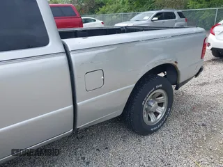 2004 Ford Ranger XL Fleet with VIN 1FTYR44U14PB06953, listed as a IAAI auction lot 42251150 with 166,507 mi miles and . Bid and sale history available at DreamBid. Image 6.