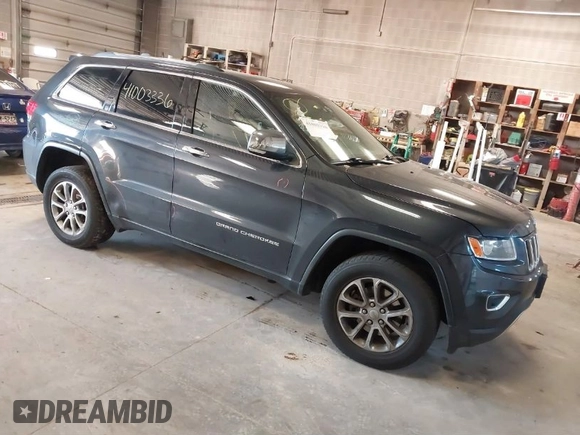 2015 Jeep Grand Cherokee Limited with VIN 1C4RJFBG5FC941811, listed as a IAAI auction lot 41003336 with 137,867 mi miles. Bid and sale history available at carsss.com. Image 1.