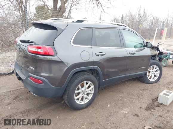 2015 Jeep Cherokee Latitude with VIN 1C4PJMCS9FW769294, listed as a IAAI auction lot 41810346 with 94,975 mi miles and . Bid and sale history available at DreamBid. Image 4.