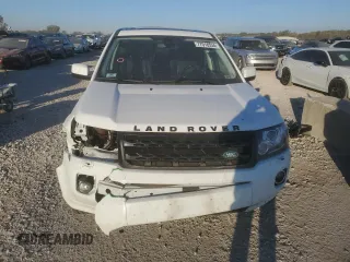 2015 Land Rover LR2 с VIN SALFP2BG2FH425427, выставлен на аукционе Copart как лот 77018534 с пробегом 132 602 миль миль и Списание • Salvage title. История ставок и продаж доступна на DreamBid. Изображение 5.