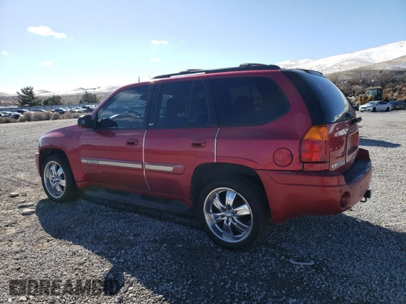 2004 GMC Envoy SLT with VIN 1GKDT13S242417226, listed as a Copart auction lot 46111865 with 375,450 mi miles and Salvage Title. Bid and sale history available at DreamBid. Image 2.