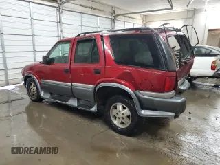 1999 GMC Jimmy SLE with VIN 1GKDT13W3X2535602, listed as a Copart auction lot 83250924 with 203,134 mi miles and Salvage Title. Bid and sale history available at carsss.com. Image 2.