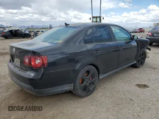 2009 Volkswagen Jetta GLI z VIN 3VWDJ71K79M042969, wystawiony jako Copart lot #50803665 z przebiegiem 191 689 mil mil oraz Szkoda całkowita • Salvage title. Historia ofert i sprzedaży dostępna na DreamBid. Obrazek 3.