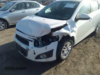 2014 Chevrolet Sonic LT with VIN 1G1JC6SH6E4172219, listed as a IAAI auction lot 41771776 with 71,054 mi miles. Bid and sale history available at carsss.com. Image 6.