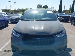 2021 Chrysler Pacifica Hybrid Limited z VIN 2C4RC1S76MR544495, wystawiony jako IAAI lot #42294312 z przebiegiem 89 083 mil mil oraz . Historia ofert i sprzedaży dostępna na DreamBid. Obrazek 12.