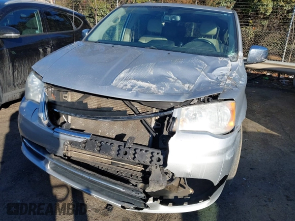 2011 Chrysler Town & Country Touring L with VIN 2A4RR8DGXBR714238, listed as a IAAI auction lot 41283027 with 205,498 mi miles and . Bid and sale history available at DreamBid. Image 6.