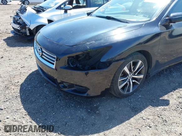 2014 Nissan Maxima S with VIN 1N4AA5AP0EC445232, listed as a IAAI auction lot 42154984 with 91,205 mi miles and . Bid and sale history available at DreamBid. Image 13.