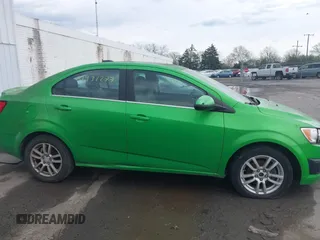 2015 Chevrolet Sonic LT with VIN 1G1JC5SH7F4152878, listed as a IAAI auction lot 41931277 with 180,189 mi miles and . Bid and sale history available at DreamBid. Image 13.