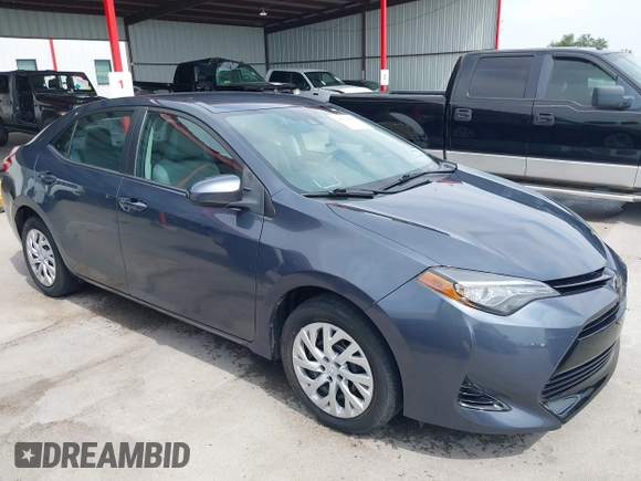 2018 Toyota Corolla L with VIN 5YFBURHE8JP770696, listed as a IAAI auction lot 42386025 with 63,224 mi miles and . Bid and sale history available at DreamBid. Image 1.