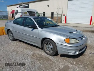 2004 Pontiac Grand Am GT z VIN 1G2NW52E74C179558, wystawiony jako IAAI lot #42191752 z przebiegiem 256 688 mil mil oraz . Historia ofert i sprzedaży dostępna na DreamBid. Obrazek 1.