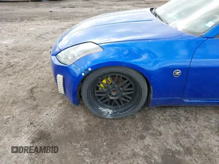 2004 Nissan 350Z Touring with VIN JN1AZ34E04T052916, listed as a IAAI auction lot 41450917 with 157,699 mi miles. Bid and sale history available at carsss.com. Image 6.