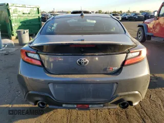 2024 Toyota GR86 with VIN JF1ZNBB13R9751411, listed as a Copart auction lot 70136954 with 11,543 mi miles and Salvage Title. Bid and sale history available at carsss.com. Image 6.