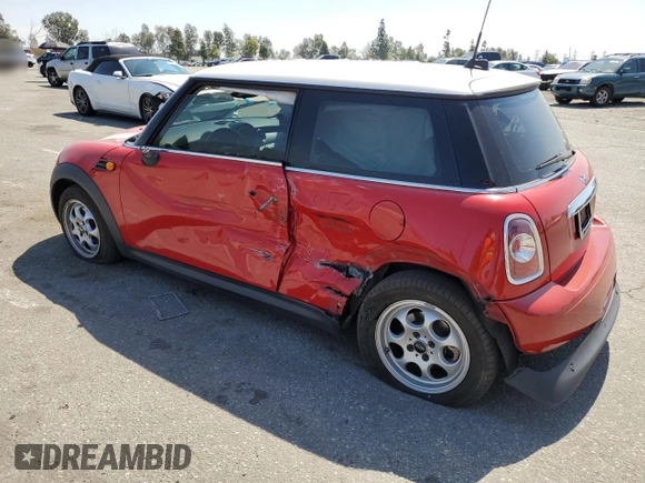 2012 MINI Hardtop with VIN WMWSU3C53CT257045, listed as a Copart auction lot 51662035 with 176,567 mi miles and Salvage Title. Bid and sale history available at DreamBid. Image 2.