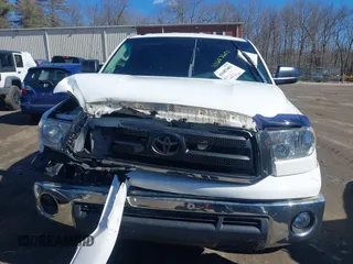 2010 Toyota Tundra 4WD Truck with VIN 5TFUM5F10AX015321, listed as a IAAI auction lot 41687601 with 117,939 mi miles. Bid and sale history available at carsss.com. Image 12.
