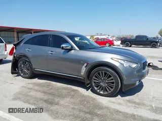 2015 Infiniti QX70 with VIN JN8CS1MW1FM481233, listed as a IAAI auction lot 41976458 with 134,875 mi miles and . Bid and sale history available at DreamBid. Image 13.