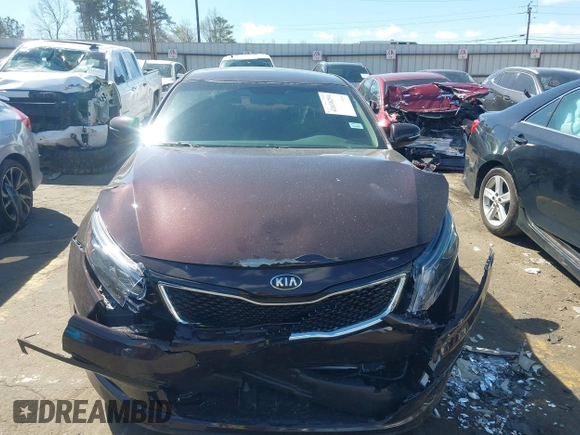 2015 Kia Optima LX z VIN 5XXGM4A71FG463939, wystawiony jako IAAI lot #41838294 z przebiegiem 70 274 mil mil oraz . Historia ofert i sprzedaży dostępna na DreamBid. Obrazek 12.