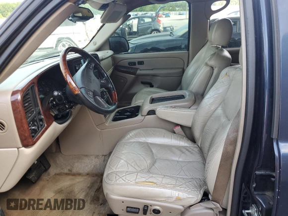 2004 GMC Yukon SLT z VIN 1GKEC13ZX4R203707, wystawiony jako Copart lot #56866075 z przebiegiem Nie podano mil oraz Szkoda całkowita • Salvage title. Historia ofert i sprzedaży dostępna na DreamBid. Obrazek 7.
