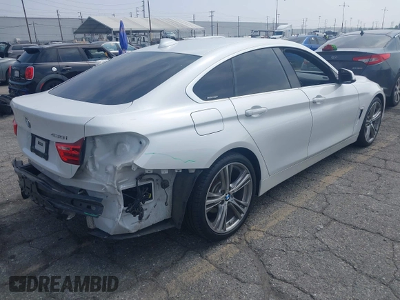 2017 BMW 4 Series 430i with VIN WBA4F7C54HG437984, listed as a IAAI auction lot 42429305 with 112,591 mi miles and . Bid and sale history available at DreamBid. Image 4.