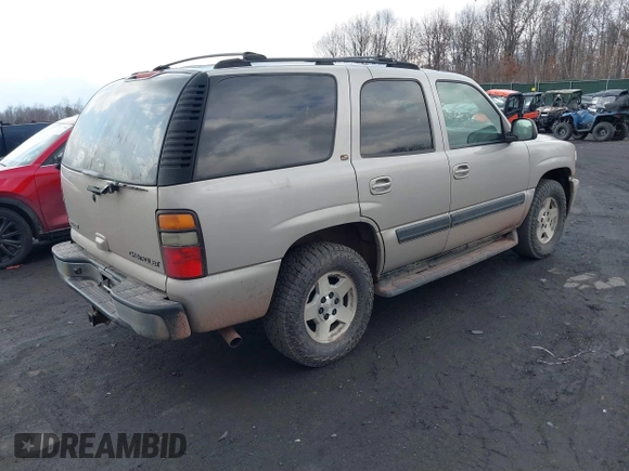 2005 Chevrolet Tahoe LS z VIN 1GNEK13T05J197479, wystawiony jako IAAI lot #41693575 z przebiegiem 124 537 mil mil oraz . Historia ofert i sprzedaży dostępna na DreamBid. Obrazek 4.
