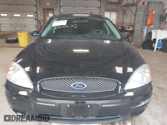 2004 Ford Taurus SE z VIN 1FAFP53U74G107504, wystawiony jako IAAI lot #42068692 z przebiegiem Nie podano mil oraz . Historia ofert i sprzedaży dostępna na DreamBid. Obrazek 12.