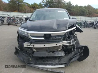2021 Honda Pilot EX-L z VIN 5FNYF6H57MB031712, wystawiony jako Copart lot #77119974 z przebiegiem 140 118 mil mil oraz Nie do naprawy • Non repairable. Historia ofert i sprzedaży dostępna na DreamBid. Obrazek 5.