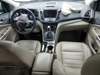 2013 Ford Escape SEL z VIN 1FMCU9HX4DUB05173, wystawiony jako Copart lot #57918125 z przebiegiem 197 195 mil mil oraz Szkoda całkowita • Salvage title. Historia ofert i sprzedaży dostępna na DreamBid. Obrazek 8.