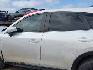 2020 Mazda CX-5 Touring with VIN JM3KFACM9L0771919, listed as a IAAI auction lot 41527773 with 93,417 mi miles and . Bid and sale history available at DreamBid. Image 15.