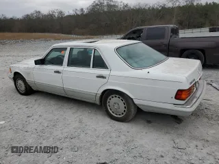 1989 Mercedes-Benz 560 with VIN WDBCA39E0KA469417, listed as a Copart auction lot 43929215 with 52,559 mi miles and Salvage Title. Bid and sale history available at DreamBid. Image 2.