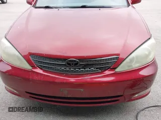 2003 Toyota Camry LE with VIN 4T1BE30K03U227243, listed as a IAAI auction lot 42063924 with 177,323 mi miles and . Bid and sale history available at DreamBid. Image 6.
