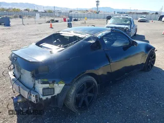 2004 Nissan 350Z Touring with VIN JN1AZ34D94M102990, listed as a IAAI auction lot 41830661 with 107,520 mi miles. Bid and sale history available at carsss.com. Image 4.