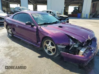 1997 Ford Mustang Cobra with VIN 1FALP47V0VF117976, listed as a Copart auction lot 72975454 with 165,076 mi miles and Salvage Title. Bid and sale history available at carsss.com. Image 4.