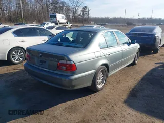 2001 BMW 5 Series 525iA with VIN WBADT43401GX23027, listed as a IAAI auction lot 41488393 with 200,960 mi miles. Bid and sale history available at carsss.com. Image 3.