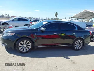 2014 Lincoln MKS with VIN 1LNHL9DK7EG608912, listed as a IAAI auction lot 41722004 with 211,051 mi miles. Bid and sale history available at carsss.com. Image 15.