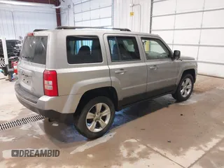 2014 Jeep Patriot Sport with VIN 1C4NJPBB2ED758884, listed as a IAAI auction lot 41290599 with 136,655 mi miles and . Bid and sale history available at DreamBid. Image 4.