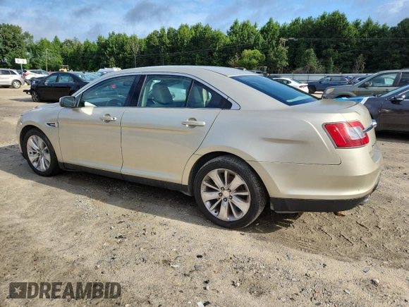 2010 Ford Taurus Limited with VIN 1FAHP2FW7AG138753, listed as a Copart auction lot 64880025 with 242,728 mi miles and Clean title. Bid and sale history available at DreamBid. Image 2.
