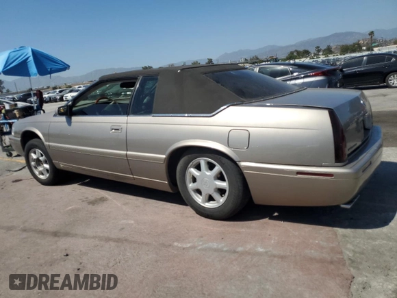 2002 Cadillac Eldorado Touring ETC z VIN 1G6ET12952B101866, wystawiony jako Copart lot #57365965 z przebiegiem Nie podano mil oraz Tytuł czysty. Historia ofert i sprzedaży dostępna na DreamBid. Obrazek 2.