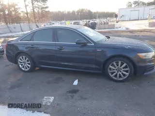 2015 Audi A6 Premium Plus with VIN WAUFGAFC1FN004306, listed as a IAAI auction lot 41244953 with Not provided miles and . Bid and sale history available at DreamBid. Image 13.