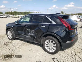2023 Cadillac XT4 AWD Luxury with VIN 1GYFZBR49PF101377, listed as a Copart auction lot 73961294 with 26,847 mi miles and Salvage Title. Bid and sale history available at carsss.com. Image 2.