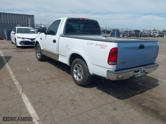 1999 Ford F-150 Work Series with VIN 2FTZF1729XCA83871, listed as a IAAI auction lot 42009506 with 234,988 mi miles. Bid and sale history available at carsss.com. Image 3.