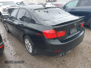 2015 BMW 3 Series 328i with VIN WBA3A5G50FNS91133, listed as a IAAI auction lot 41890141 with 119,495 mi miles. Bid and sale history available at carsss.com. Image 3.