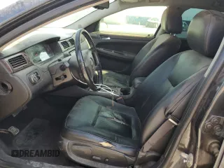 2013 Chevrolet Impala LTZ with VIN 2G1WC5E36D1227326, listed as a Copart auction lot 52451975 with 195,479 mi miles and Clean Title. Bid and sale history available at DreamBid. Image 7.