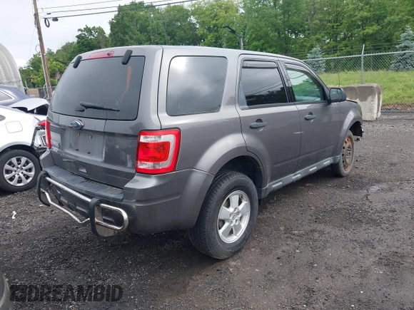 2012 Ford Escape XLS with VIN 1FMCU0C74CKB60736, listed as a IAAI auction lot 42384887 with 97,258 mi miles and . Bid and sale history available at DreamBid. Image 4.