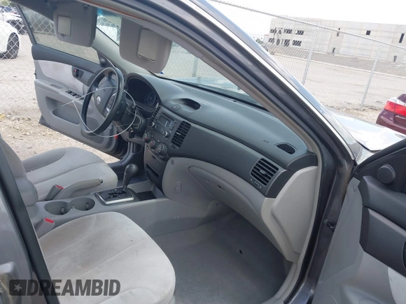 2007 Kia Optima LX z VIN KNAGE123375110290, wystawiony jako IAAI lot #42586225 z przebiegiem 49 928 mil mil oraz . Historia ofert i sprzedaży dostępna na DreamBid. Obrazek 5.