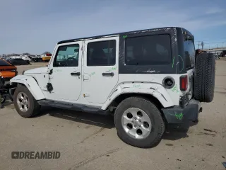 2015 Jeep Wrangler Unlimited Sahara with VIN 1C4BJWEG7FL768712, listed as a Copart auction lot 49963335 with 100,053 mi miles and Salvage Title. Bid and sale history available at carsss.com. Image 2.