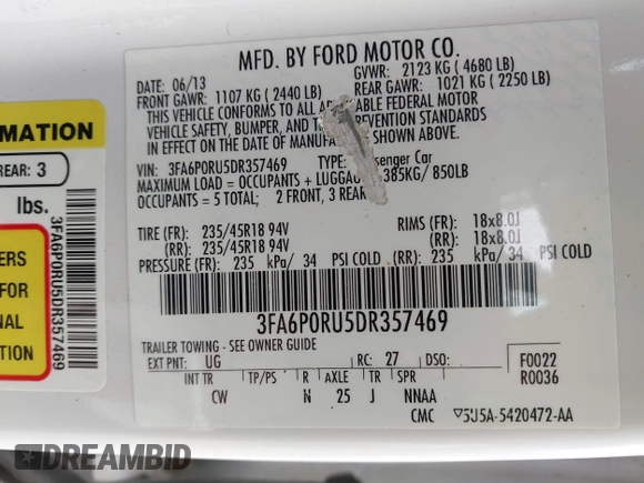 2013 Ford Fusion Titanium Hybrid with VIN 3FA6P0RU5DR357469, listed as a IAAI auction lot 41969315 with 215,732 mi miles. Bid and sale history available at carsss.com. Image 9.