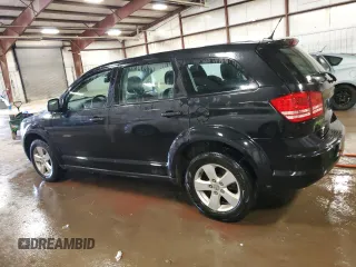 2013 Dodge Journey American Value with VIN 3C4PDCABXDT502334, listed as a Copart auction lot 58428235 with 162,009 mi miles and Clean title. Bid and sale history available at DreamBid. Image 2.